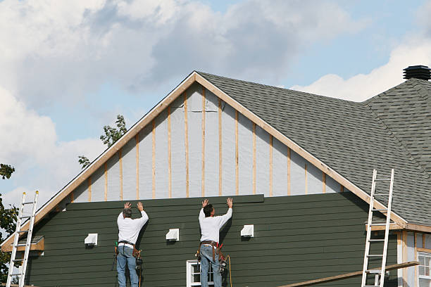 Professional Siding Replacement technician working in Freeport, PA